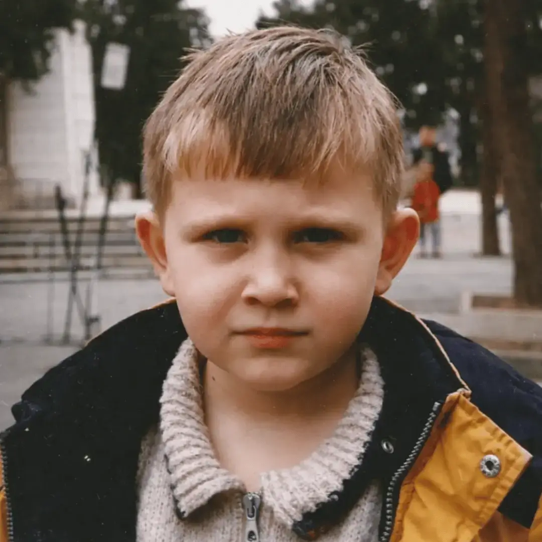 Me as a young boy outdoors wearing a jacket